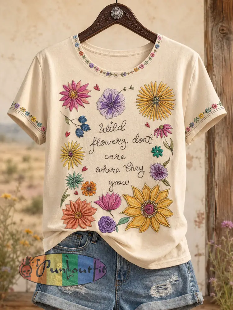Women’s ’wildflowers don’t care where they grow’ T-shirts - Apricot · S